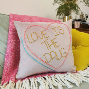 Love Is The Drug Embroidered Heart Cushion